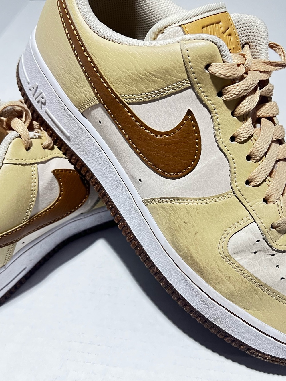 Nike Low-Top Sneakers — Cream & Brown Accents